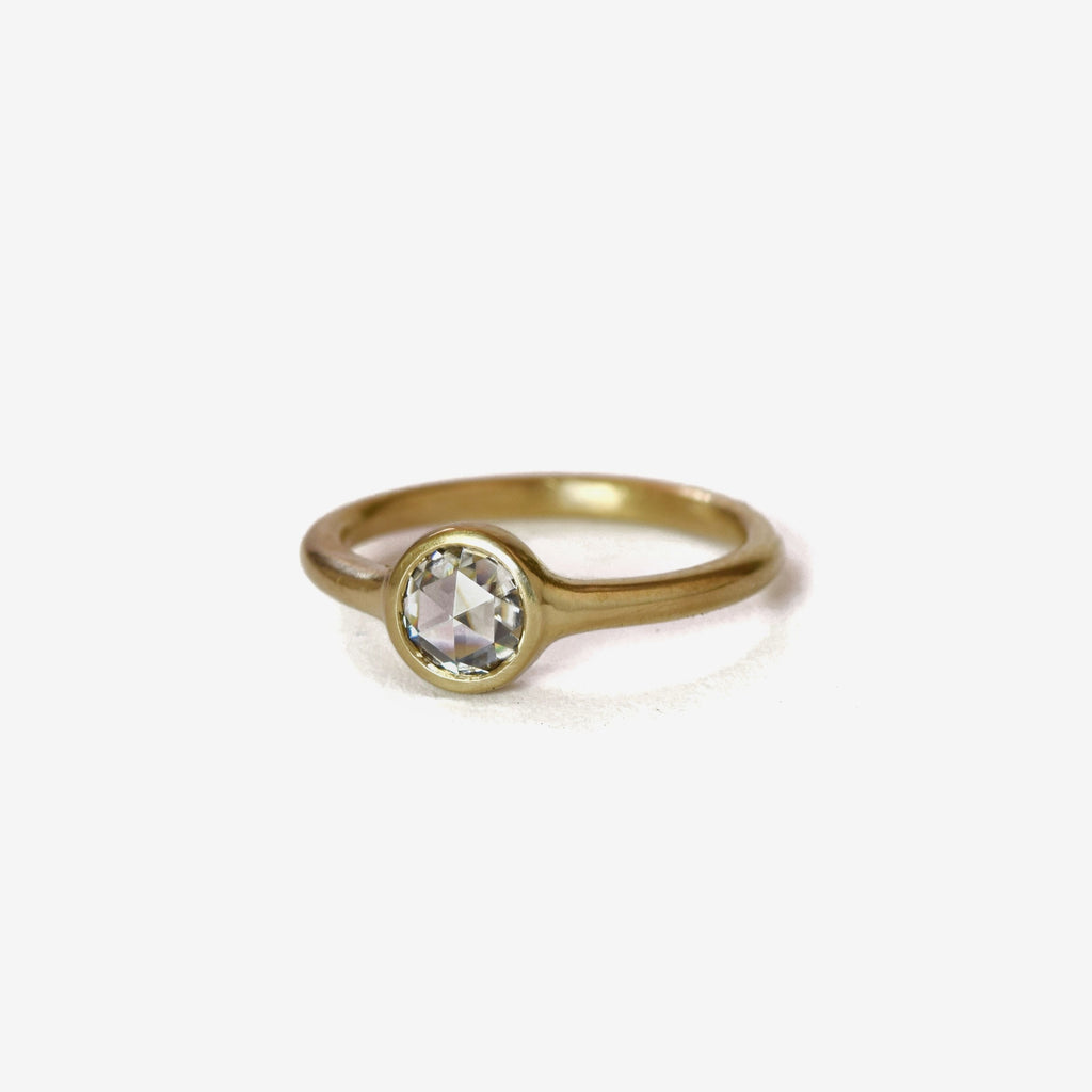 colorless round rose cut diamond ring in 18k gold