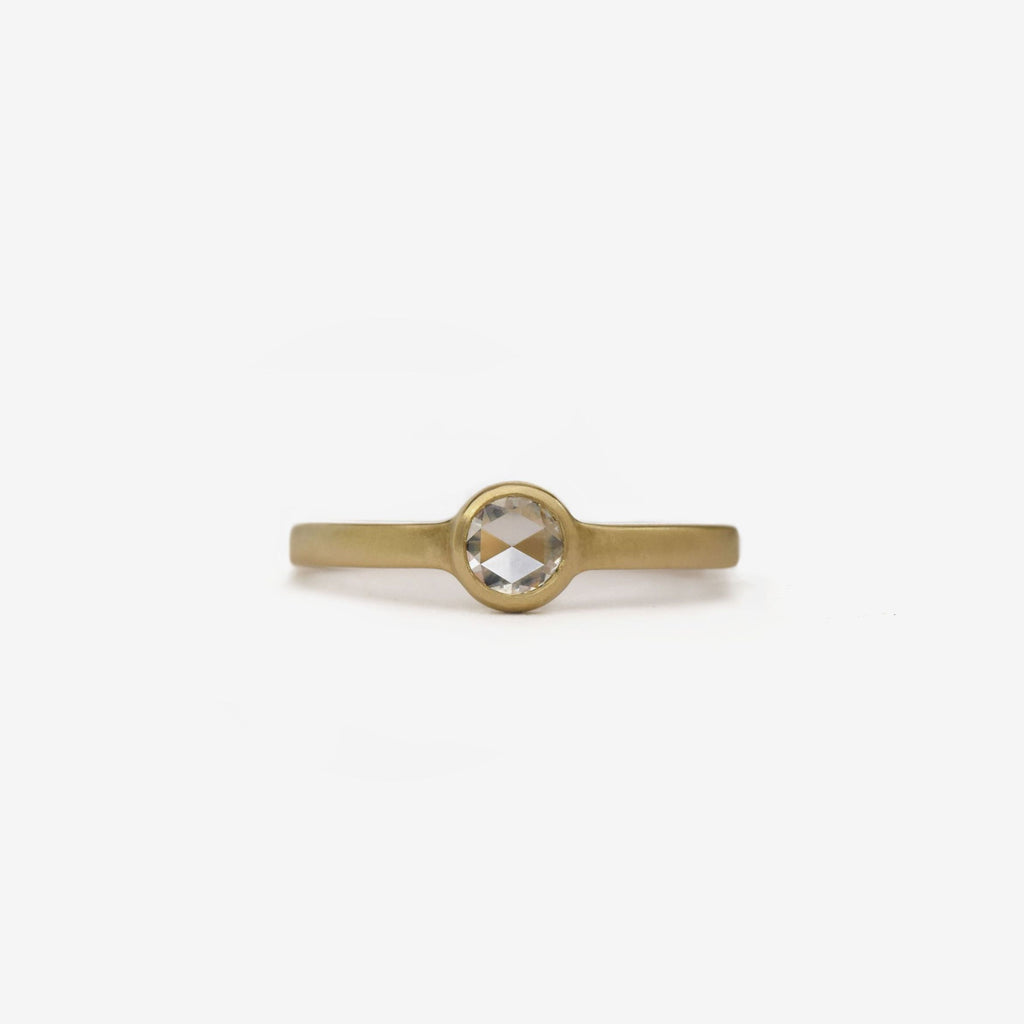 rose cut round diamond solitaire flat band bezel ring in 14k yellow gold