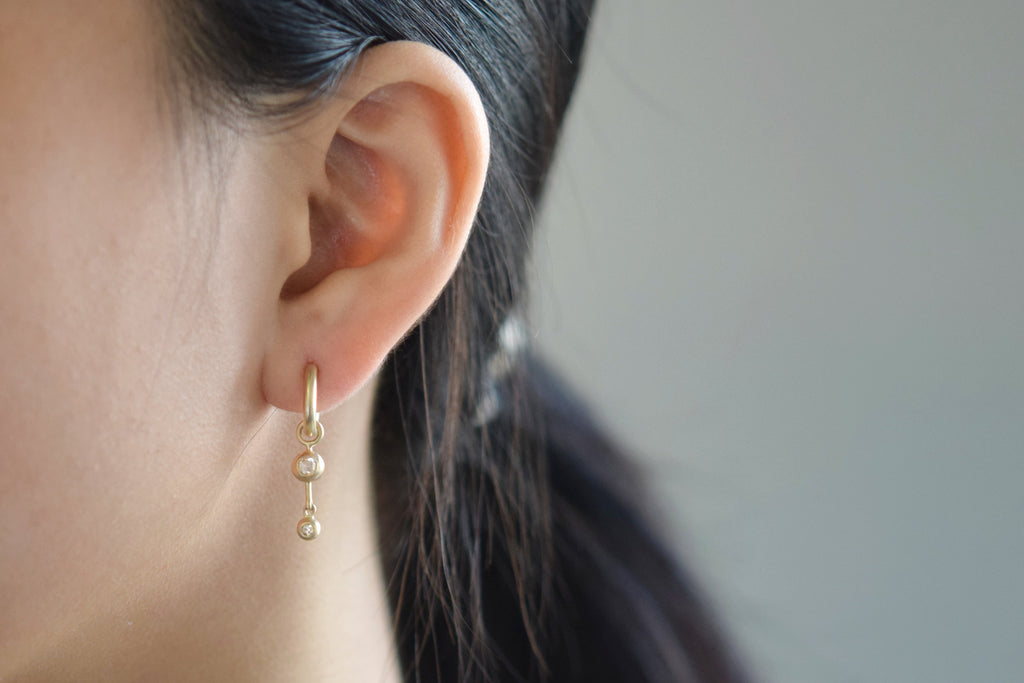 removable rose cut diamond drop gold earrings - on model